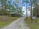 A scenic view of Archie J. Miller Memorial Park leading to the lake at 14143 Conifer Dr, Orlando, FL 32832