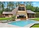 Backyard featuring a sparkling private pool and a spacious patio area perfect for relaxation and entertainment at 14143 Conifer Dr, Orlando, FL 32832