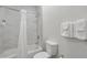 Bright bathroom with white fixtures, shower and tub combination, and fresh towels at 14501 Grove Resort Ave # 2103, Winter Garden, FL 34787