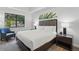 Cozy bedroom featuring comfortable bedding, soft lighting, and elegant furnishings at 14501 Grove Resort Ave # 2103, Winter Garden, FL 34787