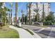 Community entrance featuring lush landscaping and an elegant sign at 14501 Grove Resort Ave # 2103, Winter Garden, FL 34787