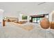 Spacious lobby with modern decor, comfortable seating, and bright natural light at 14501 Grove Resort Ave # 2103, Winter Garden, FL 34787