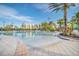 Spacious resort-style pool with ample seating and lush landscaping at 14501 Grove Resort Ave # 2103, Winter Garden, FL 34787
