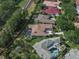 Close aerial shot highlighting homes with pools and mature landscaping, creating a private and picturesque setting at 1570 Westover Loop, Lake Mary, FL 32746