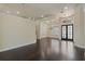 Spacious living area with hardwood floors, tray ceiling, and recessed lighting at 1570 Westover Loop, Lake Mary, FL 32746