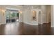 Bright open living area with hardwood floors and a view of the outdoor patio at 1570 Westover Loop, Lake Mary, FL 32746