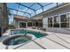 Inviting screened-in pool with an attached spa and ample space for patio furniture at 1570 Westover Loop, Lake Mary, FL 32746