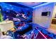 Awesome Star Wars themed ' bedroom with vibrant wall decor and custom bedding at 1781 Sawyer Palm Pl, Kissimmee, FL 34747