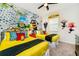 Fun ' bedroom with playful Minions-themed decor and twin beds at 1781 Sawyer Palm Pl, Kissimmee, FL 34747
