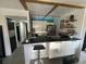 Well-designed kitchen with breakfast bar that opens to the rest of the home with stainless steel appliances at 1935 Conway Rd # T6, Orlando, FL 32812