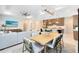 Modern dining area open to the kitchen and living room, perfect for entertaining and everyday living at 1938 Spring Shower Cir, Kissimmee, FL 34744