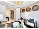 Stylish flex room featuring barrel-themed wall art, open doorway, and modern decor at 1938 Spring Shower Cir, Kissimmee, FL 34744