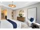 Well-appointed main bedroom showcasing elegant decor, ample natural light, and comfortable seating area at 1938 Spring Shower Cir, Kissimmee, FL 34744