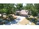 Beautiful shot of a cozy single-story home featuring a three-car garage, lush lawn, and a welcoming environment at 2082 Nexus Ct, Apopka, FL 32712