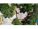 Aerial view of the house showcasing the roof and the surrounding greenery at 2082 Nexus Ct, Apopka, FL 32712