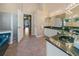 Spacious bathroom with a double sink vanity, granite countertops, and a separate shower area at 2082 Nexus Ct, Apopka, FL 32712