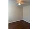 Bedroom featuring a ceiling fan, wood-look flooring, and neutral colored walls at 2164 Black Mangrove Dr, Orlando, FL 32828