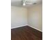 Bedroom featuring a ceiling fan, wood-look flooring, and neutral colored walls at 2164 Black Mangrove Dr, Orlando, FL 32828