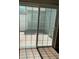 Sliding glass doors offer natural light and access to a private, fenced-in patio area at 2164 Black Mangrove Dr, Orlando, FL 32828