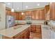 Spacious kitchen featuring granite countertops, stainless steel appliances, and a functional center island at 2401 Home Again Rd, Apopka, FL 32712