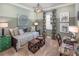 Charming bedroom with comfortable daybed, stylish decor, and window with natural light at 2458 Dream Home Ct, St Cloud, FL 34772