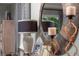 Living room detail featuring a lamp, decor and a mirror, creating an inviting and stylish interior space at 2458 Dream Home Ct, St Cloud, FL 34772