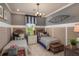 Charming bedroom featuring two twin beds with nautical-themed decor and stylish furnishings at 2460 Dream Home Ct, St Cloud, FL 34772