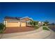 Charming single-Gathering home featuring a brick driveway and a three-car garage at 2460 Dream Home Ct, St Cloud, FL 34772