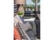 Comfortable living room featuring a plush sofa, decorative pillows, and a view to the outside at 2460 Dream Home Ct, St Cloud, FL 34772