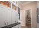Convenient pantry with ample shelving, providing organized storage space for kitchen essentials at 2460 Dream Home Ct, St Cloud, FL 34772