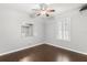 Bedroom featuring hardwood floors, a ceiling fan, and a closet at 2565 Albion Ave # 2, Orlando, FL 32833