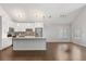 A modern kitchen with stainless steel appliances and granite countertops open to living area at 2565 Albion Ave # 2, Orlando, FL 32833