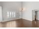 An airy living room boasts sleek flooring and an open layout at 2565 Albion Ave # 2, Orlando, FL 32833