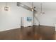 A very open living room with hardwood floors and neutral color palette at 2565 Albion Ave # 2, Orlando, FL 32833