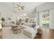Spacious living room open to the kitchen, features modern decor and ample natural light at 2565 Albion Ave # 2, Orlando, FL 32833