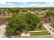 A street view shows a suburban home with a mature tree in the front yard, along with well-maintained landscaping at 2565 Albion Ave # 2, Orlando, FL 32833