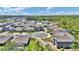 Aerial view of a residential neighborhood showcasing well-maintained homes and lush landscaping at 2628 Cedar Shake Ct, Oviedo, FL 32765