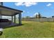 This home features a spacious backyard with covered patio area at 2628 Cedar Shake Ct, Oviedo, FL 32765