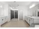 Bright bathroom featuring a walk-in shower, soaking tub, and double vanity at 2628 Cedar Shake Ct, Oviedo, FL 32765