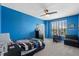 Bright bedroom with a large window at 2628 Cedar Shake Ct, Oviedo, FL 32765