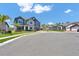Beautiful two-story home with stone accents, lush green lawn, and mature landscaping, showcasing curb appeal at 2628 Cedar Shake Ct, Oviedo, FL 32765