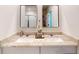 Bathroom with double sinks and granite countertops, perfect for a large Gathering and easy morning routines at 264 Towns Cir, Haines City, FL 33844