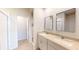 Modern bathroom features a double vanity, walk-in shower, and spacious layout at 264 Towns Cir, Haines City, FL 33844