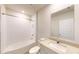 Clean bathroom featuring a tub, shower, and vanity with a granite countertop at 264 Towns Cir, Haines City, FL 33844