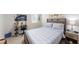 Cozy bedroom with neutral carpet, a desk, and a car-themed print to add a bit of edge at 264 Towns Cir, Haines City, FL 33844
