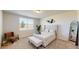 Bright bedroom with stylish furnishings, a comfortable bed, and ample natural light at 264 Towns Cir, Haines City, FL 33844