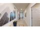 Hallway with modern decor, neutral walls, and stylish tile flooring at 264 Towns Cir, Haines City, FL 33844