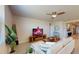 Comfortable living room with a modern TV setup, stylish decor, and cozy seating perfect for relaxation at 264 Towns Cir, Haines City, FL 33844
