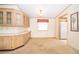 Bright dining room with built-in cabinets and counter space, and a window for natural light at 2650 Einwood Dr, Kissimmee, FL 34758