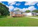 Charming single-story home featuring a wheelchair ramp and well-maintained lawn at 2650 Einwood Dr, Kissimmee, FL 34758